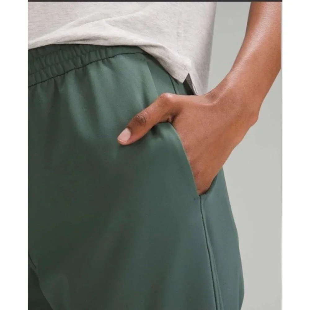 Lululemon Tapered-Leg Mid-Rise Crop 25" *Luxtreme Dark Forest Size Medium - Picture 4 of 16